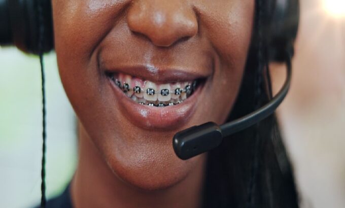 woman-employee-and-happy-with-microphone-at-call-2025-04-06-11-14-26-utc