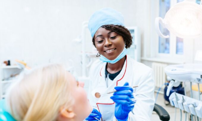 african-american-female-dentist-treating-patient-a-2025-01-29-04-39-37-utc